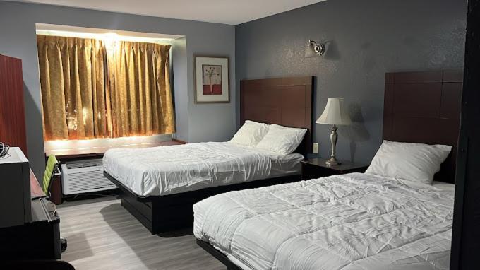 Blisspoint Inn & Suites, Northwood Esterno foto