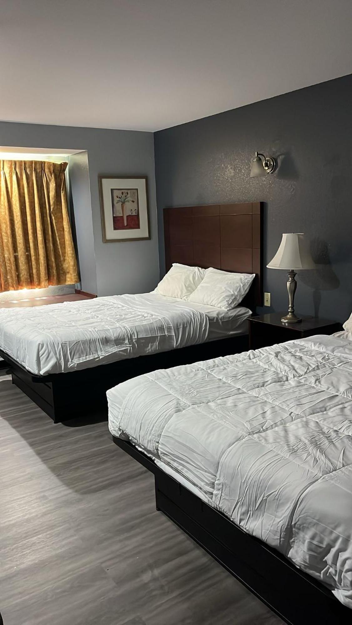 Blisspoint Inn & Suites, Northwood Esterno foto